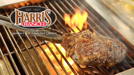 VG_HRTV_2017 Flaming grill with steak, tongs and Harris Ranch logo