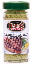 s_lemon_garlic_spice Unopened container of Harris Ranch No Salt Lemon Garlic Spice. Clear bottle with green lid. Spices are yellow and green.